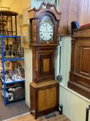 Antique mahogany and oak eight day longcase clock having painted arched dial, signed Purvis,