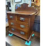 Miniature mahogany chest of two short above two long drawers, 57cm by 42cm by 26cm.