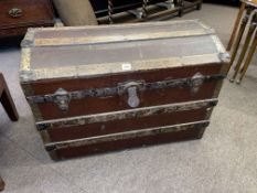 Vintage canvas bound dome topped trunk and collection of teddies and dolls.