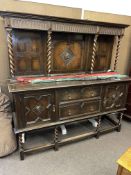 Early 20th Century oak Jacobean style canopy backed sideboard, 178cm by 183cm by 58cm.