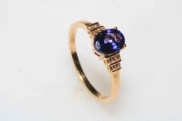 Tanzanite and diamond 18 carat gold ring, size R/S, with certificate.