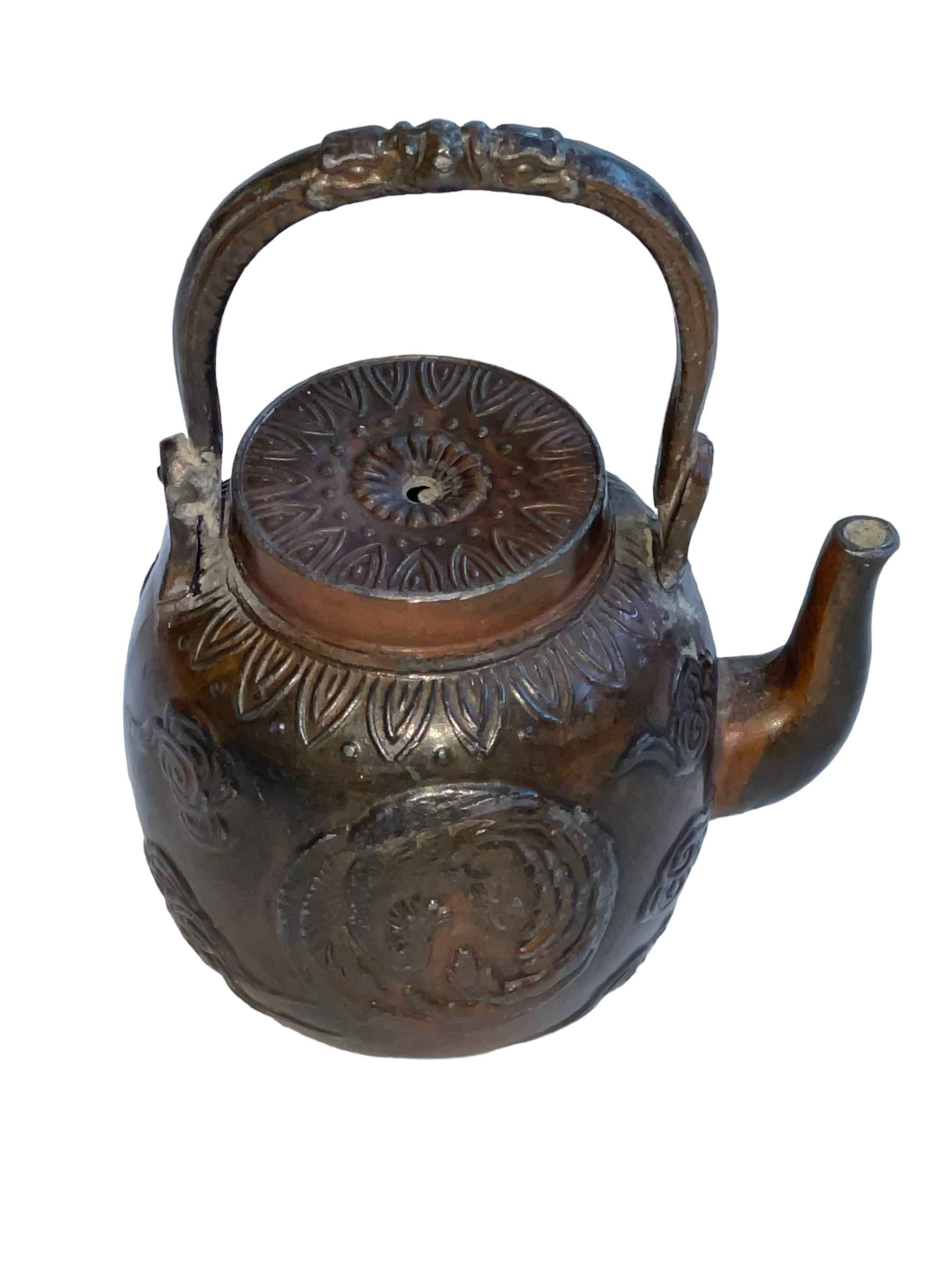 19th Century Chinese bronze water dropper in the form of a teapot decorated with embossed dragon