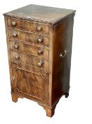 Slim Victorian mahogany pedestal cupboard having hinged lid above three drawers with cupboard door