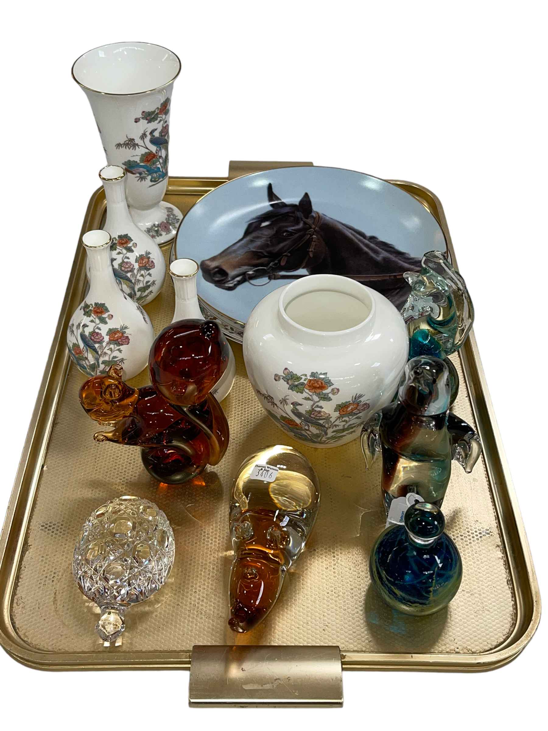 Glass animal paperweights, Wedgwood Kutani Crane, and Fred Stone plate.