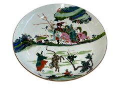 Chinese circular plaque depicting Hunters on Horseback and Man Fighting a Tiger,