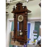 Victorian walnut Vienna style pendulum wall clock having enamelled and gilt painted dial, 83cm.