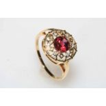 Garnet and diamond 9 carat gold ring, size R/S, with certificate.