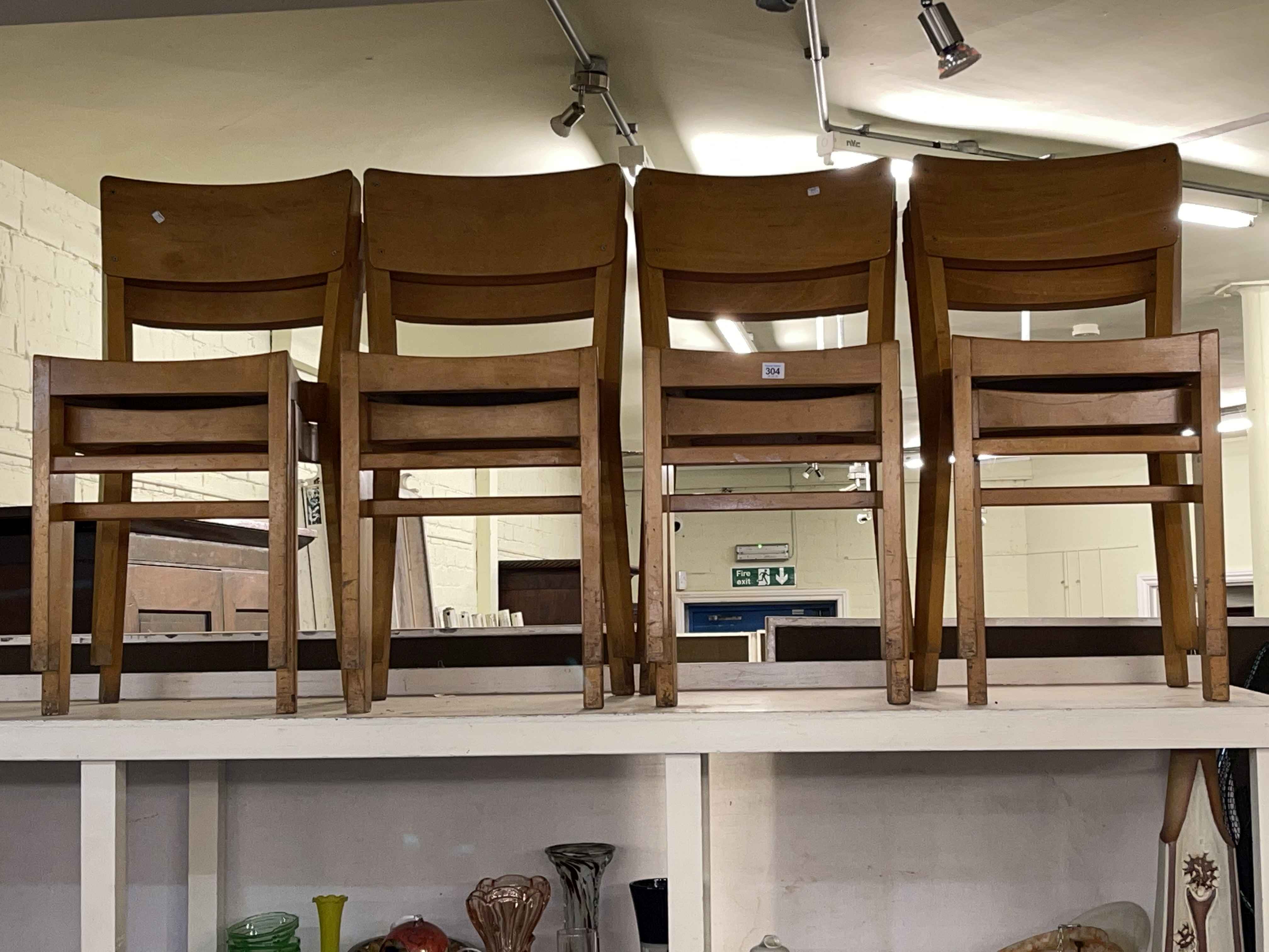 Set of eight vintage stacking school chairs.