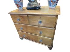Victorian pine chest of two short above two long drawers on turned legs, 96cm by 101cm by 49cm.