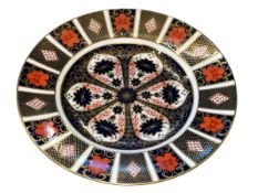 Five Royal Crown Derby Imari 27cm plates, one of very slightly different design.