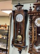 Victorian walnut and ebonised single weight Vienna style wall clock having enamelled dial, 125cm.