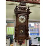 Victorian walnut Vienna style pendulum wall clock having enamelled and gilt decorated dial and