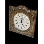 Embossed silver mounted mantel clock, 15cm.