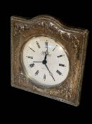 Embossed silver mounted mantel clock, 15cm.