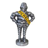 Cast metal Michelin Man in chrome colour, 38cm.