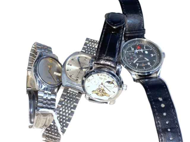 Four gents wristwatches.