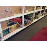 Full shelf of model railway engines, carriages, rolling stock,