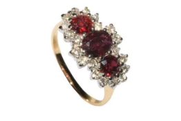 Handsome ruby and diamond yellow and white 18ct gold ring,