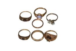 Four 9 carat gold rings, set eternity ring and two others (7).