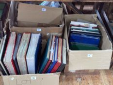 Four boxes of stamp albums, loose stamps, etc.