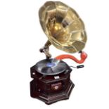 Victrola octagonal table top gramophone with bras shorn.