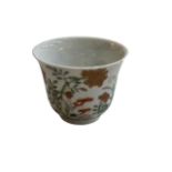 Small Chinese tea bowl decorated with floral design with four character mark, 6.5cm.