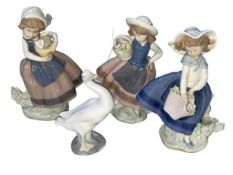 Four pieces of Lladro.