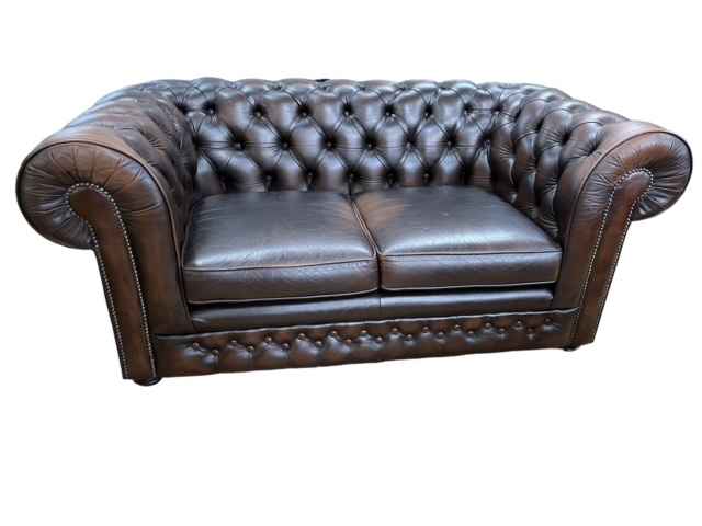 Thomas Lloyd brown deep buttoned and studded leather two seater Chesterfield settee.