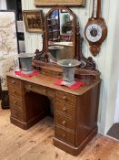 Victorian mahogany nine drawer pedestal dressing table, 160cm by 122cm by 56cm.