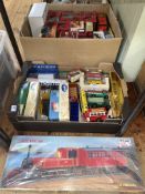 Two boxes of Corgi and Matchbox model vehicles and Minicraft model kits 1872 Vulcan Saddleback