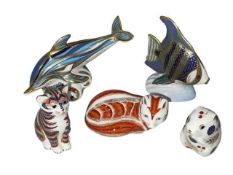 Five Royal Crown Derby paperweights including dolphin, angel fish and fox.