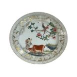 Chinese porcelain export plate decorated with farmer, oxon and birds, 23cm diameter.