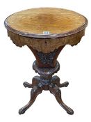 Victorian mahogany and inlaid walnut oval work table, 74cm by 50cm by 40cm.