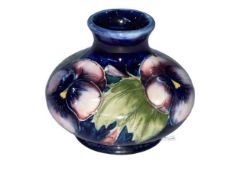 Small Moorcroft onion shape vase, 7cm.