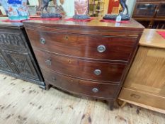 19th Century mahogany bow front chest of three long drawers on splayed bracket feet,