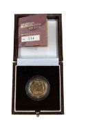 A Royal Mint fine gold 1/4 oz proof Britannia £25 2003 coin, boxed with certificate.