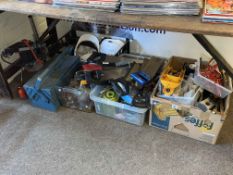 Collection of tools, helmets, oil cans, etc.