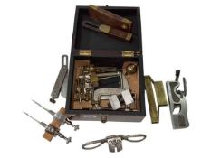 Box of vintage tools including levels, spoke shaves, etc.