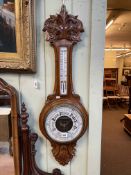 Victorian carved oak aneroid barometer.