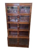 Early 20th Century mahogany five height bookcase with ten bevelled glass doors, 174.