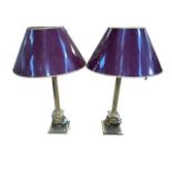 A pair of tall brass columned table lamps and shades, 89cm.