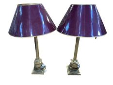 A pair of tall brass columned table lamps and shades, 89cm.