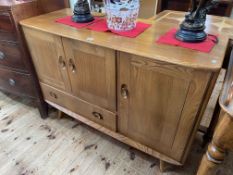 Ercol Windsor three door sideboard, 82cm by 144cm by 48cm.