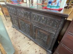 19th Century carved oak sideboard having three frieze drawers above a central carved panel flanked