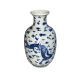 Chinese blue and white vase decorated with dragons and clouds, six character mark to base, 16cm.