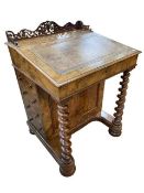 Victorian burr walnut Davenport having secret stationery drawer fitted with ink bottles,