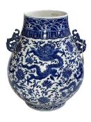 Large Chinese blue and white two handled bulbous vase decorated with dragons and flowers,