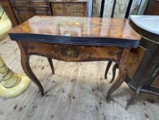 Continental style inlaid serpentine front fold top games table on cabriole legs, 78.