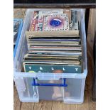 Box of LP records and singles.