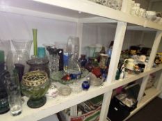 Full shelf of china and glass including Ringtons, coloured glass, slate and oak mantel clocks,